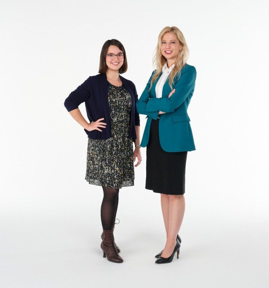 Two personal injury attorneys standing together